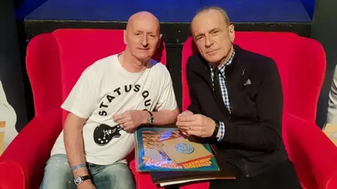 Andy Campbell Andy Campbell with Francis Rossi, from the band