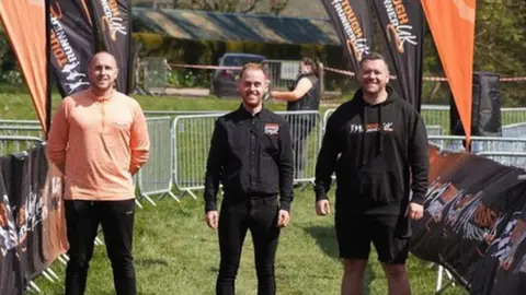 Ed Morris Adam Newton in the middle, at a tough runner event