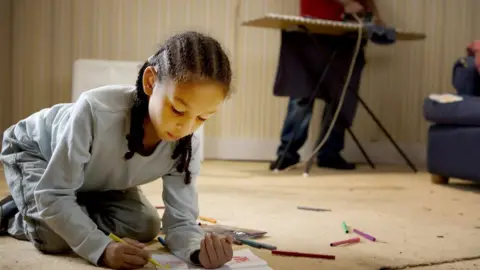 Getty Images Child doing schoolwork from home