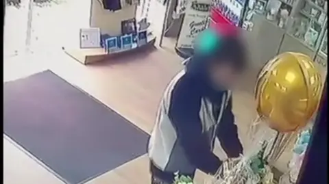 Julie Ruscitto CCTV showing a man stealing from the shop