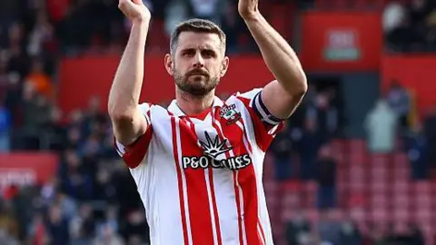 Jack Stephens applauds the Southampton fans 