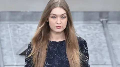 Getty Images Gigi Hadid on the runway of the Chanel fashion show