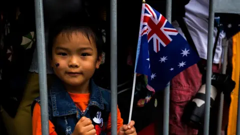 Getty Images Melbournians enjoy the Australia Day Parade in Swanston St Melbourne on January 26, 2017 in Melbourne, Australia.