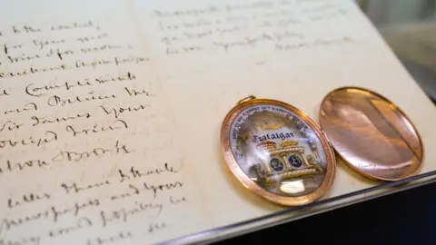 PA Media Locket and a letter