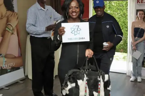 Claire Painchaud Viola Davis with one of Nthenya Mwendwa's cow hide bags