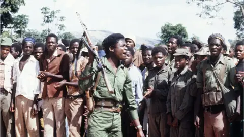 AFP A picture taken on February 6, 1980 shows members of the black nationalist guerrillas of the Zimbabwean African Liberation Army (Zala), led by Robert Mugabe, staging a rally in an unknown place in Zimbabwe.