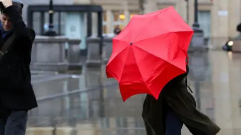 Getty Images Umbrella in the wind