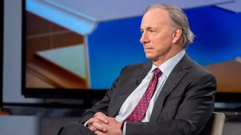 Getty Images Hedge fund billionaire Ray Dalio has said capitalism is "now not working"