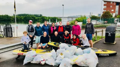 Jim Brooks-Dowsett In just an hour-and-a-half these paddle boarders picked all these bags filled with plastic out of the Taff