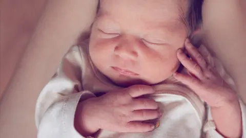 Getty Images A newborn baby asleep