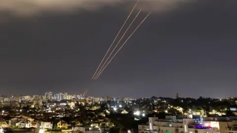 Reuters Israel's anti-missile system operating over Ashkelon, 14 Apr 24