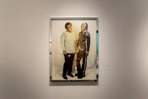 Deana Lawson Framed portrait of two women standing side by side