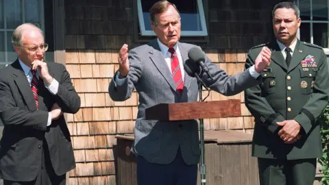 AFP/Getty Images Dick Cheney, President Bush and General Colin Powell in 1990