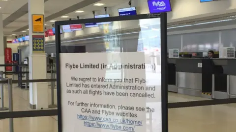 Information board on Flybe at Aberdeen Airport