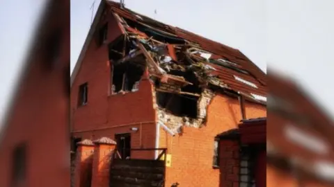 Family Makar’s war-damaged home in Bucha