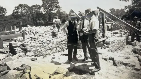 Maureen Ratcliffe Tom Troughton and William Ratcliffe discussing plans