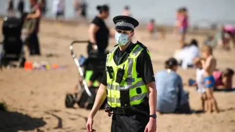 Getty Images policeman on beach