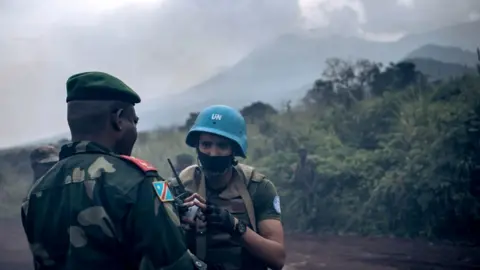 Getty Images Congolese general speaks to Monusco officer in Virunga national park - 22 February