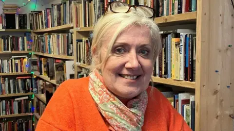 Guy Campbell/BBC Suzie Grogan in her bookshop