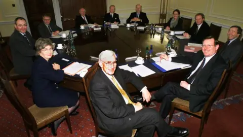 Getty Images/PAUL FAITH Northern Ireland's first power-sharing executive met on December 1999 for the first time