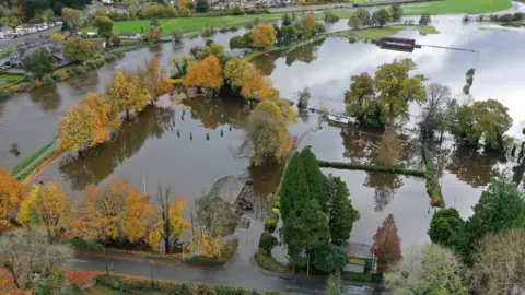 Getty Images An aerial drone view of flooded fields as the River Conwy bursts its banks on October 30, 2020 in Llanrwst, Wales