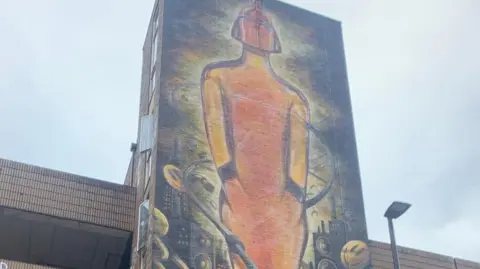 An image of a Brit Award trophy painted on a car park in Manchester city centre