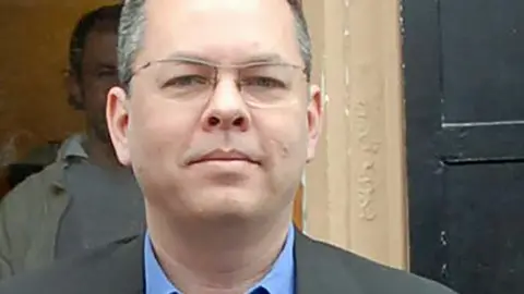 AFP This undated photo made available by the Dogan News Agency on March 13, 2018 shows Andrew Brunson, an American pastor, in Izmir.