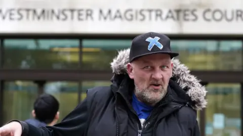 PA Media Simon Parry outside Westminster Magistrates' Court