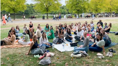 Holly Cooke Women at a London Lonely Girls Club meetup.