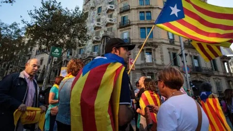 Getty Images Protesters gather in Barcelona