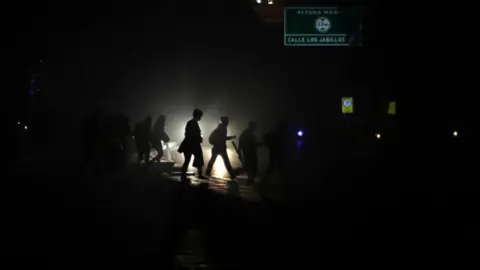 EPA People walking home in the dark