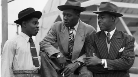 Getty Images The Empire Windrush arrived at Tilbury Docks, Essex, on 22 June 1948