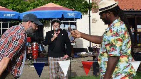 Yanny Mac Conker match between two people