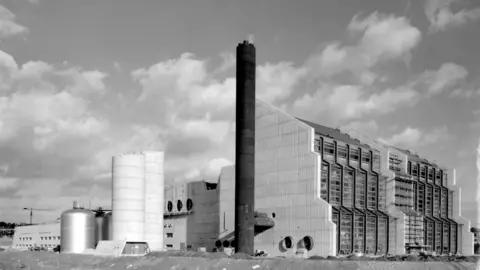 Carlsberg Brewery, showing silos, chimney and large concrete building