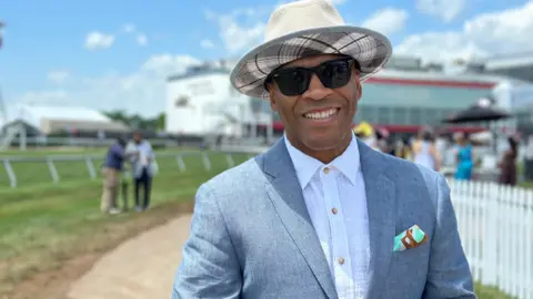 BBC/Brandon Drenon Anthony Walker stands on the infield of Pimlico