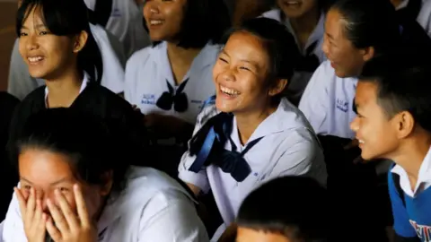 Reuters Children smile after being told the news of some of the children's rescues