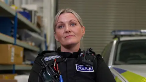 Kate Warren in police uniform