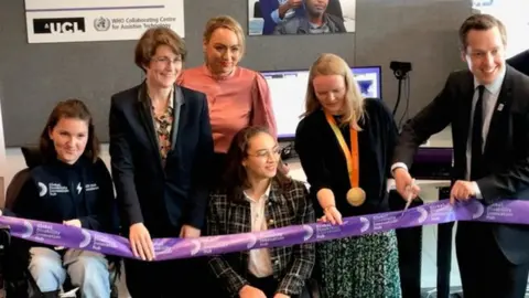 MP Tom Pursglove cuts a ribbon at the event