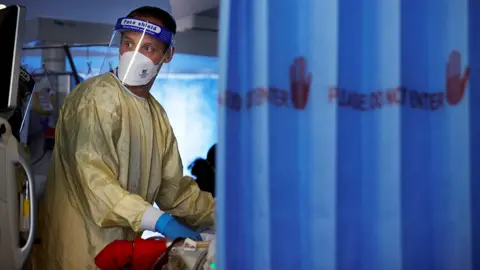 Getty Images Nurse with Covid patient