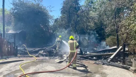 Essex Fire and Rescue Crews tackling an outbuilding fire