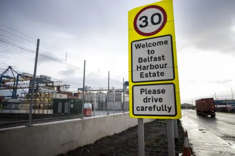 PA Media A roadside sign that reads: Welcome to Belfast Harbour Estate