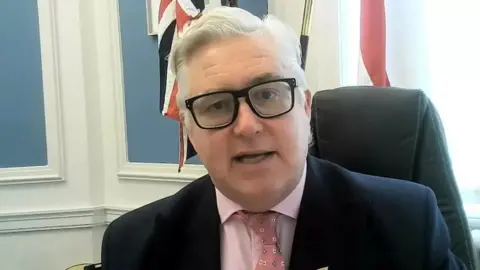 Essex County Council Man in a suit looking at the camera