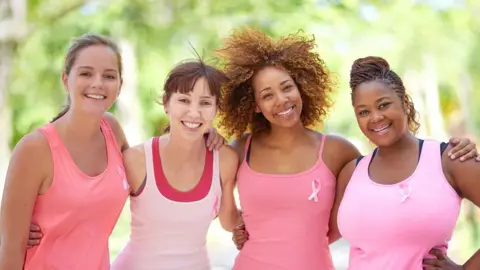 Getty Images Breast cancer awareness campaigners