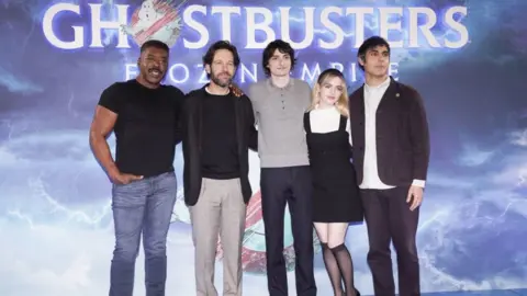 PA Media (lef-right) Ernie Hudson, Paul Rudd, Finn Wolfhard, Mckenna Grace and Gil Kenan during a photo call for the cast of Ghostbusters: Frozen Empire, at Claridges, London