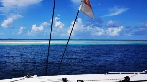 Mr Wong Mr Wong at sea in his yacht