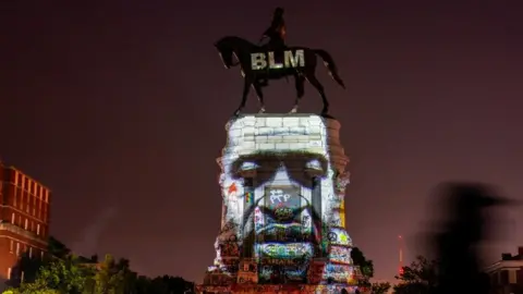 Reuters An image of George Floyd is projected on the statue of Confederate General Robert E. Lee in Richmond, Virginia, U.S. June 20, 2020