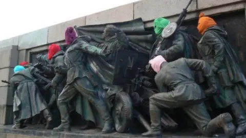 AFP Pussy Riot balaclavas on Sofia Soviet Army monument, 2013