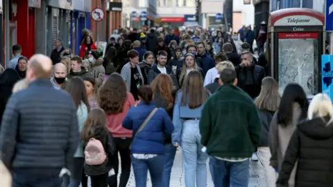 Pacemaker Footfall was heavy in parts of Belfast city centre on Sunday, days ahead of a two-week lockdown