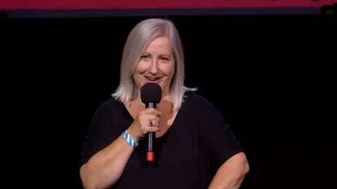 Janine on stage at BBC Ouch: Storytelling Live