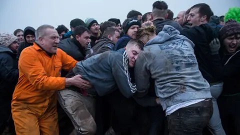 OLI SCARFF/Getty Images Haxey Hood